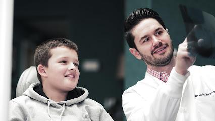 Dr. John Orthodontics - Orthodontist in Alma, MI