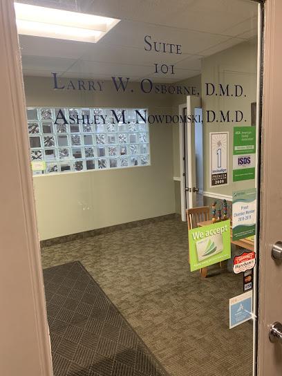 Dr. Kevin Wolf DMD and Dr. Larry Osborne DMD - General dentist in Decatur, IL
